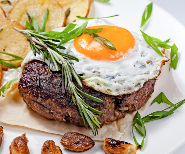 photo of - steak and egg open-face sandwich